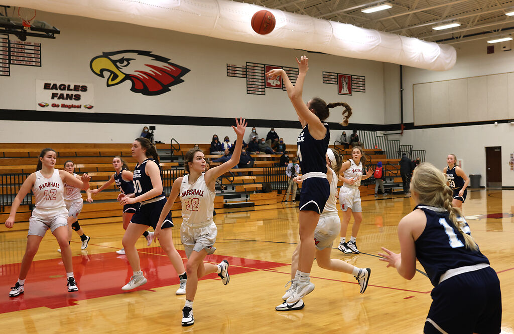 Allie Schulte attempts to block a shot